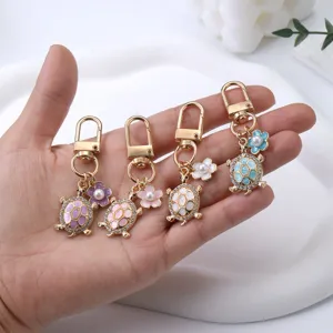 Metal turtle flower keychain bag charm cute rhinestone pearl pendant keyring gift for women.