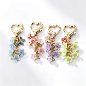 Süßer Frischer Herz Schlüsselanhänger Blume Schmetterling Bunter Zinklegierung Taschenanhänger Emaille Blumiger Schlüsselring Für Damen