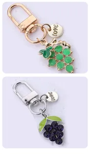 Metal grape keychain detail shot, crystal and enamel fruit bag pendant with love tag close up