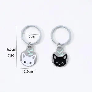 Cute black and white cat keychains with fish pendant, metal keyring for bags and keys.