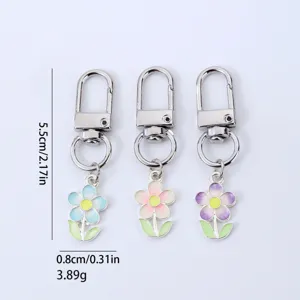 Porte-clés marguerite en métal alliage pendentif goutte d'huile mignon pour femme sac.