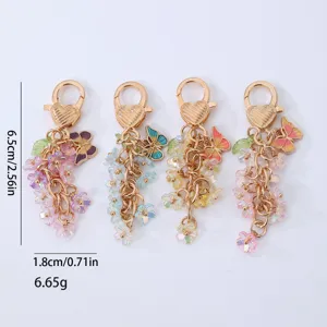 Porte-clés papillon fleur chic pendentif de sac avec fermoir cœur accessoire élégant.