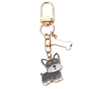 Mignon porte-clés en métal chiot Schnauzer et pendentif os pour accessoires de sac à main fourre-tout.