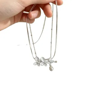 Silberne doppelseitige Schmetterling Perlen Halskette elegante Mode Damen Schmuck Alltag.