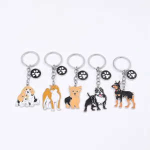 Cute metal dog keychains featuring various puppy breeds with paw charms for bags.