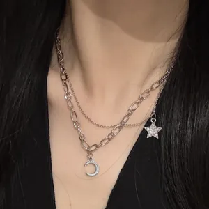 Double layer silver necklace with crescent moon and star pendants trendy minimalist jewelry.