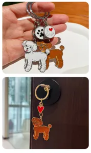 Cute cartoon poodle metal keychain with double dog charms, paw print and love text pendant.