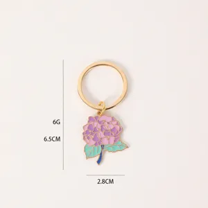 Detailed view of the enamel hydrangea flower keyring, displaying fine craftsmanship and size.