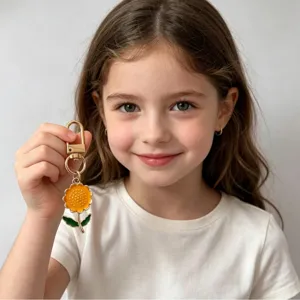 Cute sunflower metal keychain enamel flower pendant fashion bag charm gift for summer graduation.