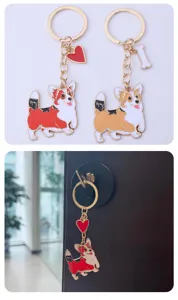 Cute cartoon Corgi metal keychain with enamel heart and bone charms for bag decoration.