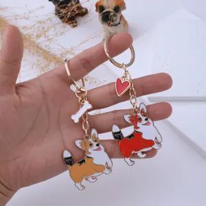 Cute Corgi metal enamel keychain set, cartoon dog keyring with bone and heart pendants for bags.