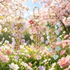 Beautiful floral metal keychain and bag charm with cute butterflies for stylish accessories.