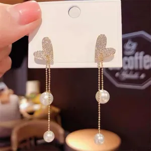 Exquisite herzförmige Kristall-Perlen-Quasten-Ohrringe, elegante goldene Ketten-Hängeohrringe für Damen.