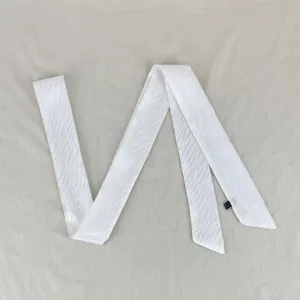 White narrow ribbon scarf with wave texture, ideal as hair tie, neck accessory or bag strap.