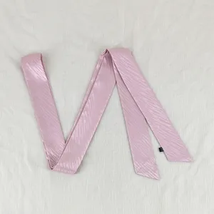 Pink wavy long ribbon scarf, versatile thin hair tie and bag strap accessory for daily use.