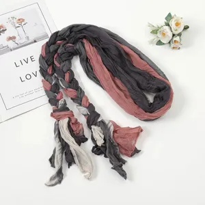 Detailed view of the multi-color braided pleated scarf headscarf with unique twisted design.