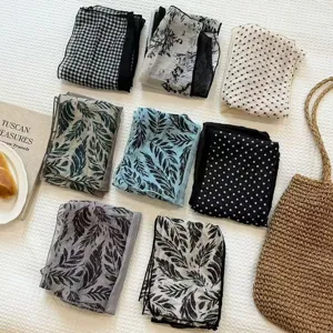 Retro Korean style lightweight printed silk scarf detail, versatile layered fashion accessory.