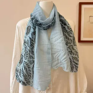Light blue leaf print scarf detail, soft lightweight fabric, retro Korean style accessory.