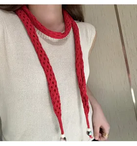 Red knitted hollow thin scarf for women, trendy dopamine style long necktie with bead decor.