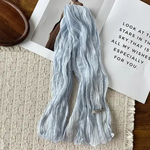 Detailed view of the Korean style pleated light blue chiffon scarf, elegant and versatile.