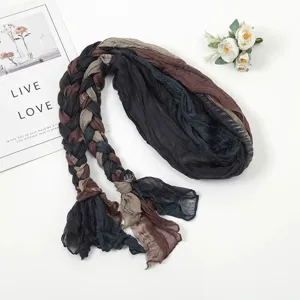 Detailed view of the multi-color spliced pleated braided scarf, unique and versatile.