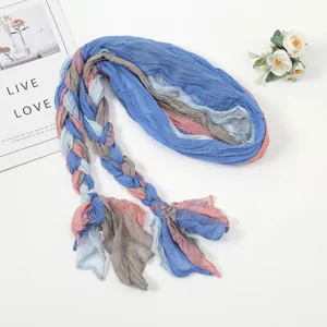 Detailed view of the colorful braided crinkle scarf, soft textured fabric for women styling.