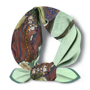 Close-up view of vintage Van Gogh art print silk scarf fabric texture and artistic detail.