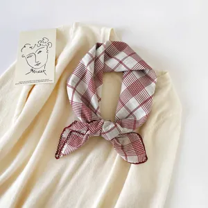 Detail view of Korean style red and white plaid small square scarf, lightweight cotton neckerchief.