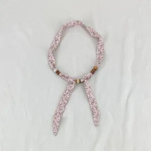 Vintage floral fabric scarf necklace with wooden beads, elegant neckerchief for women.
