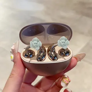 Rhinestone rose flower ear clip decoration for wireless open-ear earbuds, stylish accessory.