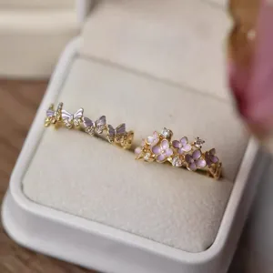 Exquisite alloy ring set featuring purple butterflies and flowers with sparkly crystals for women.