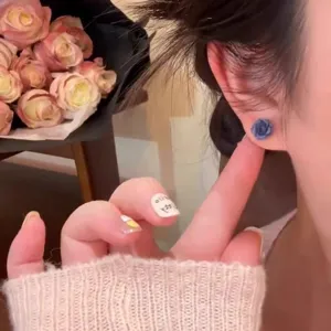 Blue rose flower stud earring detail shot showing exquisite texture and comfortable daily wear.