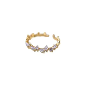 Elegant gold alloy open ring featuring purple butterfly accents and sparkling cubic zirconia.