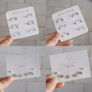 Chic silver stud earrings set featuring cute butterfly and flower designs for women daily wear.