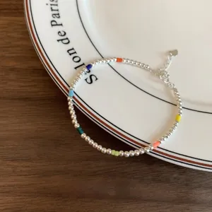 Silver beaded bracelet with colorful accents, elegant wrist chain for women everyday wear