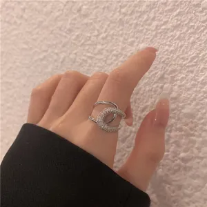Silver zircon open ring featuring a chic double-band design for women's stylish wear.