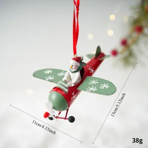 Ornement suspendu en métal avion de Noël avec un joli bonhomme de neige pour décoration.