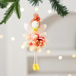 Close-up detail of cute angel flower fairy hanging ornament, soft plush festive decor.