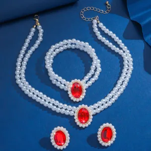 Elegante set di gioielli vintage collana bracciale e orecchini con perle e cristalli rossi