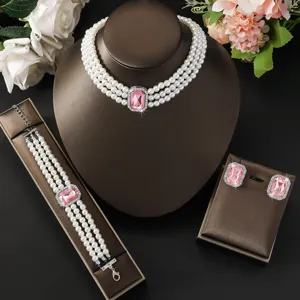 Elegante set di gioielli con collana bracciale e orecchini di perle multistrato rosa