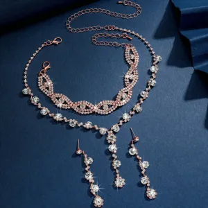 Splendido set di gioielli da sposa in strass oro rosa con collana e orecchini dettagliati.