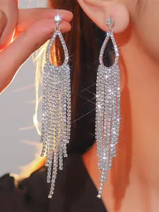 Lunghi orecchini con nappe di strass da donna, brillanti orecchini pendenti in cristallo, gioielli eleganti.