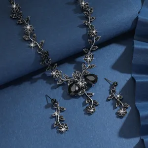 Squisito set di gioielli con collana e orecchini floreali in cristallo nero elegante.