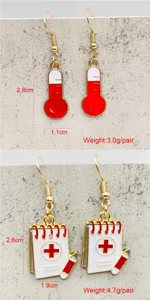 Nurse themed alloy drop earrings, thermometer and medical notebook design, lightweight and chic.