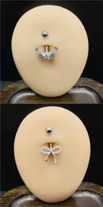 Edler Bauchnabelring aus Edelstahl mit AAA Zirkon Schmetterling und Schleife für Piercing.