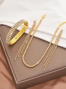 Rhinestone claw chain jewelry set featuring a crystal bracelet, necklace, and long earrings.