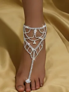 Exquisite multi-layer rhinestone toe-ring anklet detail, stunning beach body jewelry accessory.