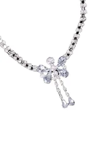 Rhinestone butterfly anklet detail shot, sparkling crystal chain for beach party style.
