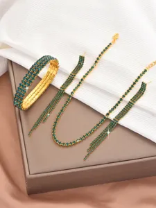 Elegant rhinestone claw chain jewelry set with green crystals, necklace and bracelet.