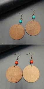 Wooden round earrings detail shot, retro style with turquoise and red beads, drop dangle hook.